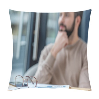 Personality  Thoughtful Man Sitting In Cafe With Glasses On Foreground Pillow Covers