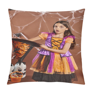 Personality  Shocked Child In Halloween Witch Costume Holding Pointed Hat On Brown Background, Spooky Season Pillow Covers