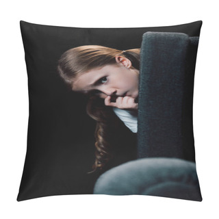 Personality  Frightened Child Looking At Camera While Hiding Behind Armchair Isolated On Black Pillow Covers