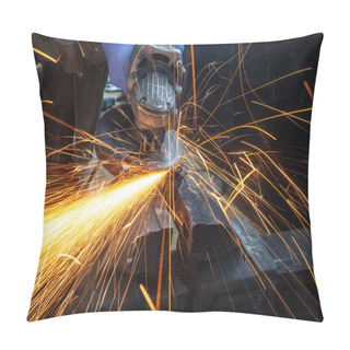 Personality  Close-up On The Sides Fly Bright Sparks From The Angle Grinder Machine. A Young Male Welder In A White Working Gloves Grinds A Metal Product With Angle Grinder In The Garage Pillow Covers