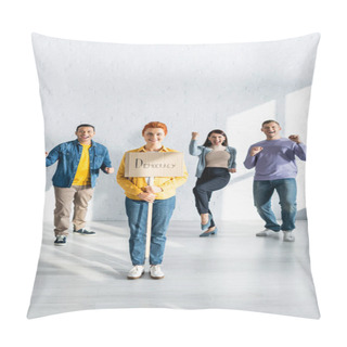 Personality  Happy Woman Holding Placard With Democracy Lettering Near Happy Multicultural People Dancing On Background Pillow Covers