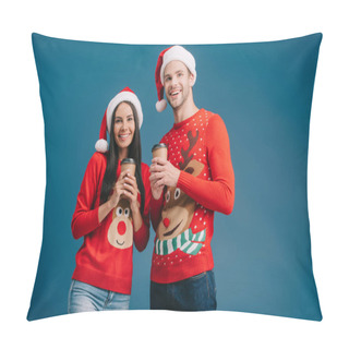 Personality  Smiling Couple In Santa Hats And Christmas Sweaters Holding Coffee To Go Isolated On Blue Pillow Covers