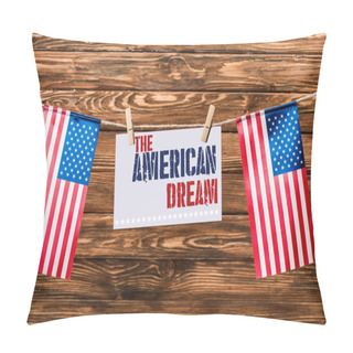 Personality  Card With The American Dream Lettering Hanging On String With Pins And American Flags On Wooden Background Pillow Covers
