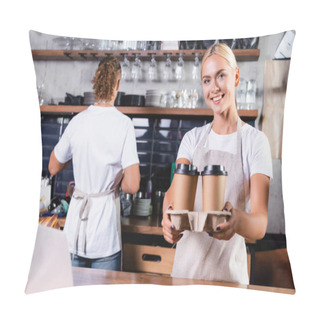 Personality  Cheerful Blonde Barista Holding Coffee To Go Near Colleague On Background Pillow Covers