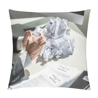Personality  Cropped View Of Businessman Holding Crumbled Paper Near Petitions For Bankruptcy At Workplace On Blurred Background Pillow Covers