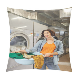Personality  Cheerful Young Asian Woman Holding Basin With Clothes Near Washing Machines In Public Laundry Pillow Covers