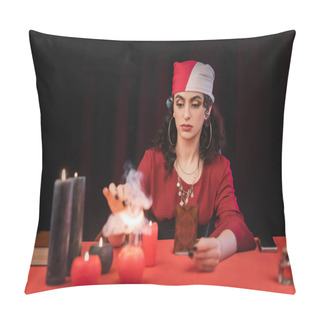 Personality  Gypsy Medium Holding Tarot Card Near Blurred Candles On Table On Black  Pillow Covers