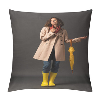 Personality  Curly Woman In Trench Coat And Rubber Boots Holding Yellow Umbrella On Black Background Pillow Covers