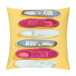 Personality  Top View Of Different Stylish Female Sneakers Placed In Row On Yellow Background Pillow Covers