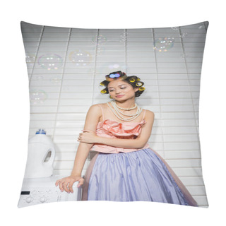 Personality  Pretty Asian Young Woman With Hair Curlers Standing In Ruffled Top, Pearl Necklace And Tulle Skirt Near Modern Washing Machine With Detergent In Laundry Room, Housewife, Looking Away, Soap Bubbles Pillow Covers