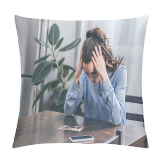 Personality  Sad Woman In Blue Blouse Sitting At Wooden Table With Smartphone And Looking At Photo In Room, Grieving Disorder Concept Pillow Covers