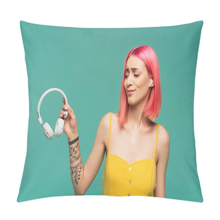 Personality  Skeptical Young Woman In Earphone Holding Wireless Headphones Isolated On Blue Pillow Covers