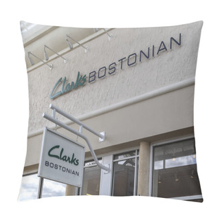 Personality  Orlando, Florida, USA- February 24, 2020: Clarks Bostonian Store Sign In Orlando, Florida, USA. C. & J. Clark International Ltd Is A British-based, International Shoe Manufacturer And Retailer.  Pillow Covers