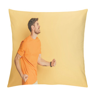 Personality  Irritated Young Man Showing Threatening Gesture And Grimacing While Looking Up On Yellow Background Pillow Covers