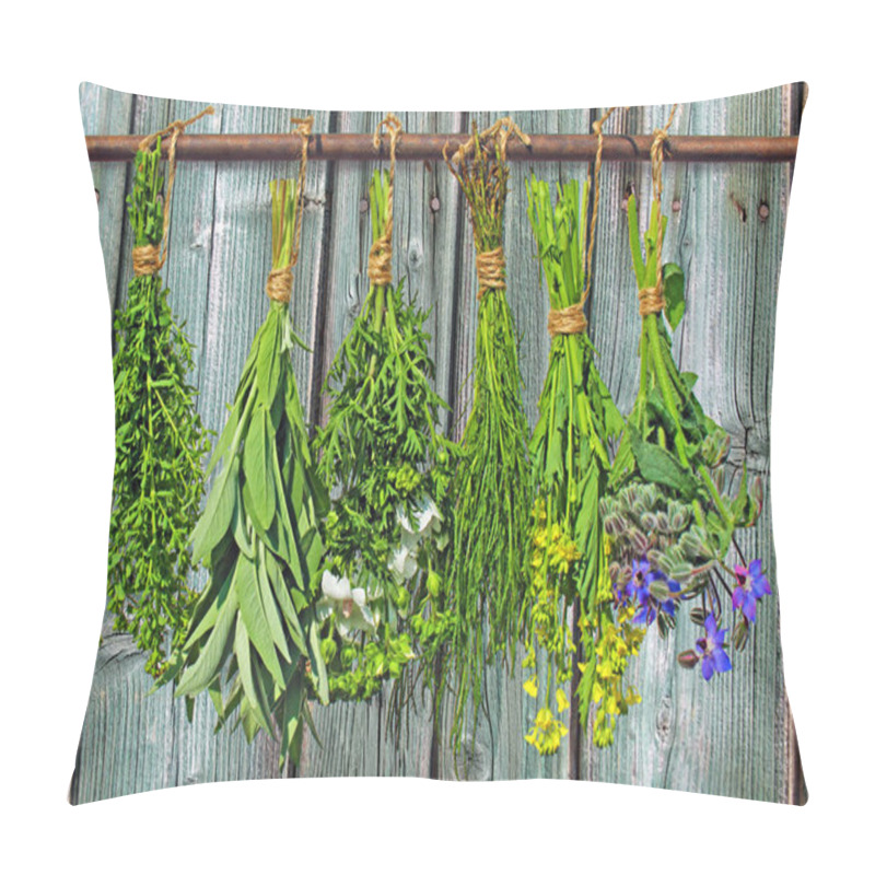 Personality  Medicinal plants hang in bundles in front of a rustic wooden wall pillow covers