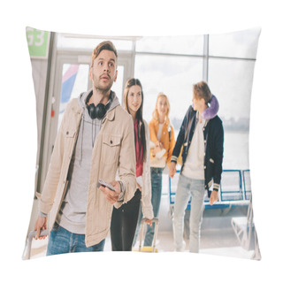 Personality  Young Man Holding Passport And Looking Up While Traveling With Friends In Airport  Pillow Covers