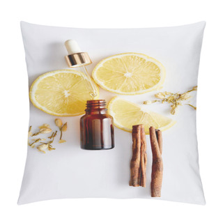 Personality  Top View Of Bottle Of Cosmetic Oil With Dropper, Slices Of Lemon, Sticks Of Cinnamon And Vanilla Buds On White Background Pillow Covers