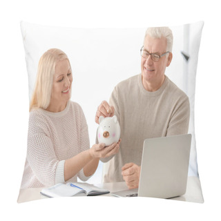 Personality  Mature Couple Putting Coin Into Piggy Bank At Home Pillow Covers