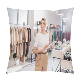 Personality  Young Seller Using Digital Tablet While Standing In Showroom With Clothes  Pillow Covers