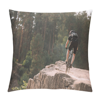 Personality  Back View Of Young Trial Biker Riding On Rocks Outdoors Pillow Covers