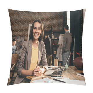 Personality  Smiling Business Woman Sitting At Desk With Laptop And Working On Project At Loft Office With Colleagues On Background Pillow Covers