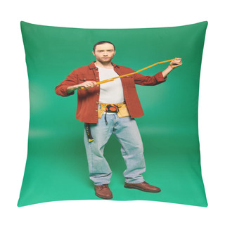 Personality  A Man In A Red Jacket Holds A Measuring Tape Against A Green Backdrop. Pillow Covers