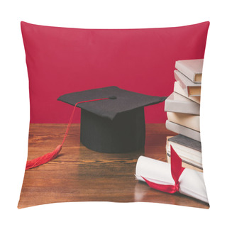 Personality  Cropped Image Of Pile Of Books With Diploma And Academic Cap On Red Pillow Covers