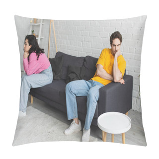 Personality  Disappointed Young Man With Hand Near Face Sitting On Couch Near Girlfriend In Living Room Pillow Covers