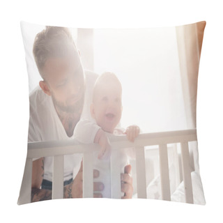 Personality  Young Bearded Man Supporting Excited Baby Boy Standing In Cot With Open Mouth Pillow Covers