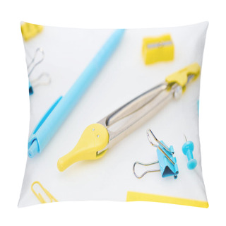 Personality  Selective Focus Of Yellow And Blue Stationery With Paper Clips, Compasses, Pencil Sharpener And Pen On White Background Pillow Covers