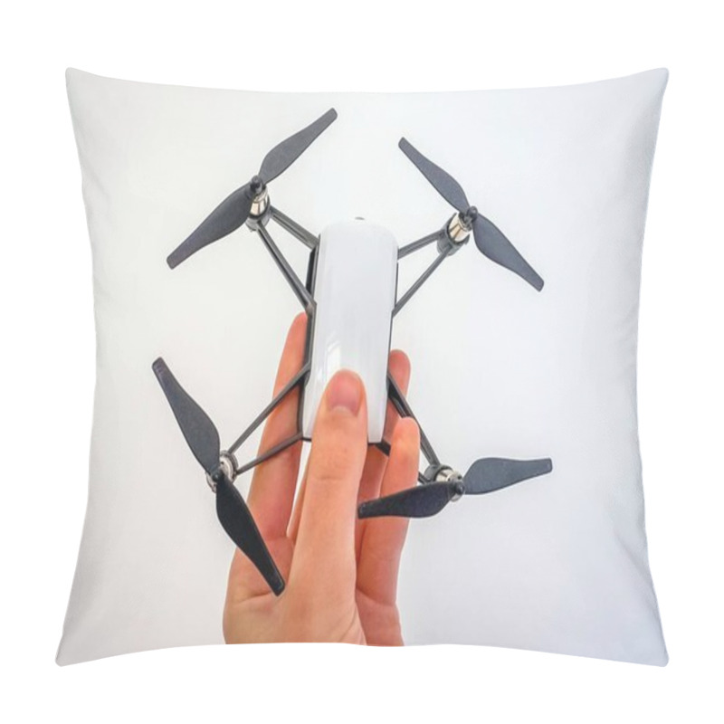 Personality  Hand Holding A Little White And Black Toy Drone. Maybe It's A Professional Drone For Aerial Photography On White Background Pillow Covers