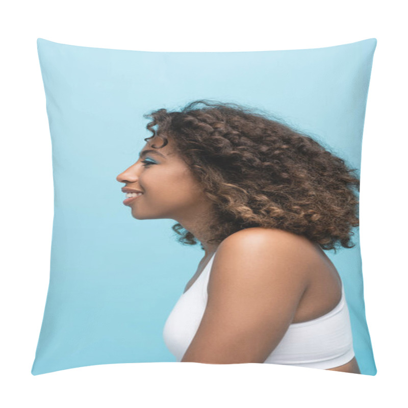 Personality  Side View Of Curly And Smiling African American Woman In White Crop Top Isolated On Blue Pillow Covers