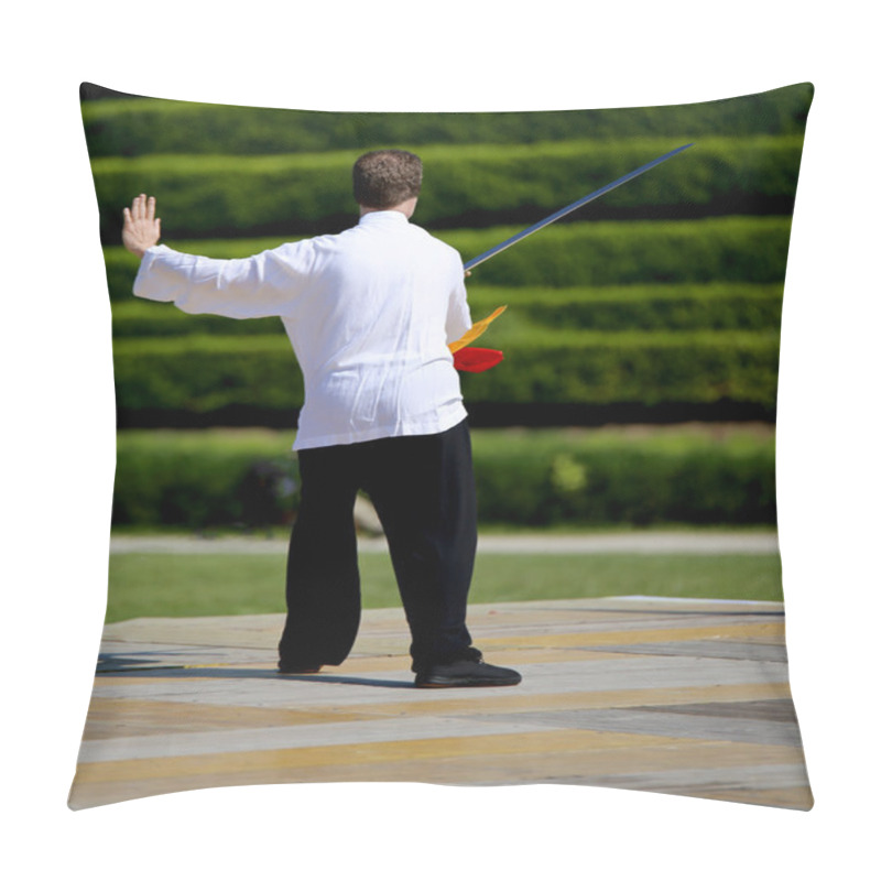 Personality  master of martial arts Tai Chi is training with sword in public  pillow covers