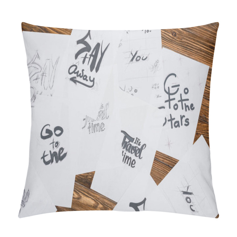Personality  top view of white papers with various words and phrases on wooden desk pillow covers