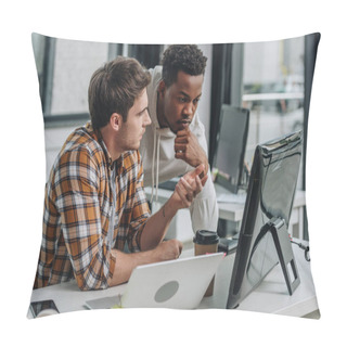 Personality  Serious Programmer Gesturing While Looking At Computer Monitor Together With African American Colleague Pillow Covers
