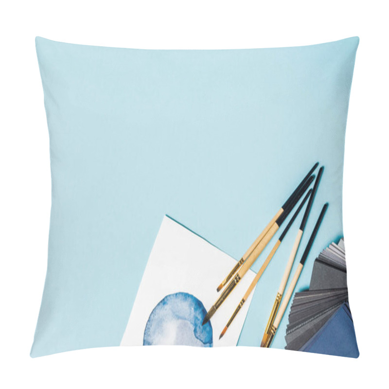 Personality  Top View Of Paintbrushes On Watercolor Painting And Color Samples On Blue Background Pillow Covers