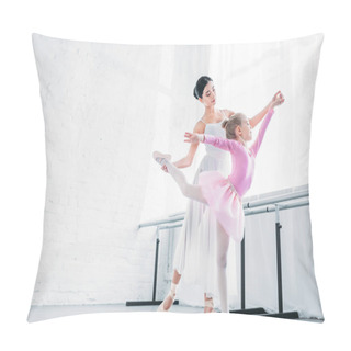 Personality  Low Angle View Of Adult Ballerina Training With Child In Pink Tutu In Ballet Studio Pillow Covers