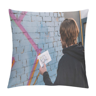 Personality  Street Artist Looking At Sketch And Painting Colorful Graffiti On Wall  Pillow Covers