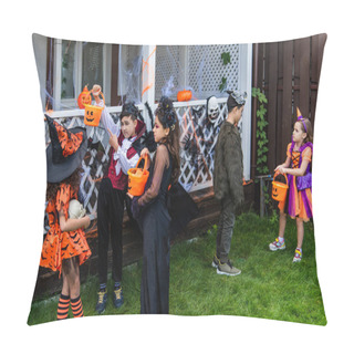 Personality  Asian Boy In Halloween Costume Pointing At Bucket Near Girls In Backyard  Pillow Covers
