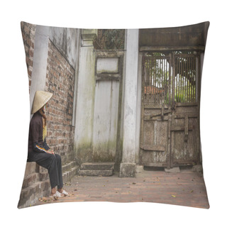 Personality  Elderly Woman Sits Alone Looking At A Locked Ancient Wooden Gate In An Old Building With Weathered Walls. Alone, Isolation Or Virus Quarantine Concepts Pillow Covers