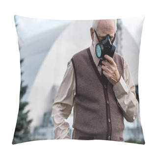 Personality  PRIPYAT, UKRAINE - AUGUST 15, 2019: Senior Man Touching Protective Mask And Standing Near Abandoned Chernobyl Reactor  Pillow Covers