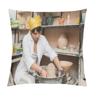 Personality  Young Asian Female Artisan In Workwear And Headscarf Molding Clay On Pottery Wheel Near Sculptures On Rack And Tools In Ceramic Workshop, Pottery Artist Showcasing Craft Pillow Covers