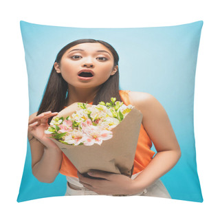 Personality  Surprised Asian Girl Looking At Camera And Holding Flowers On Blue Pillow Covers