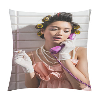 Personality  Brunette And Asian Young Woman With Hair Curlers Standing In Pink Ruffled Top, Pearl Necklace And White Gloves Smoking And Talking On Retro Phone Near White Tiles, Housewife, Holding Cigarette  Pillow Covers