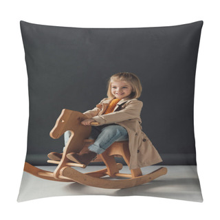 Personality  Happy Child In Trench Coat And Jeans Sitting On Rocking Horse On Black Background Pillow Covers