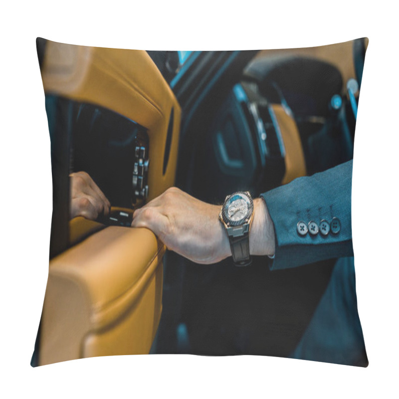 Personality  cropped image of businessman with luxury watch closing door while sitting in car pillow covers