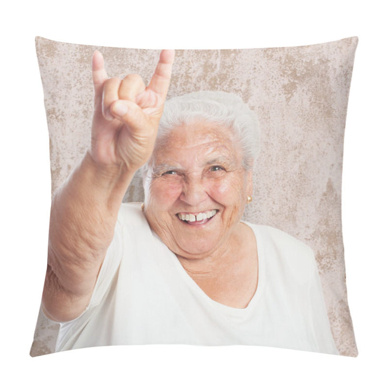 Personality  Old woman showing rock symbol pillow covers