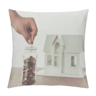 Personality  Cropped Image Of Man Putting Coin Into Glass Jar With Small House On Table, Saving Concept Pillow Covers