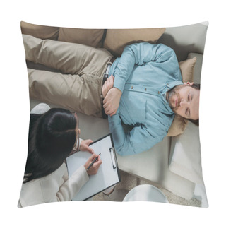 Personality  Overhead View Of Psychotherapist Writing On Clipboard And Male Patient With Closed Eyes Lying On Couch  Pillow Covers
