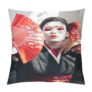 Personality  Portrait Of Beautiful Geisha With Red And White Makeup Holding Hand Fan And Gesturing In Sunlight Pillow Covers
